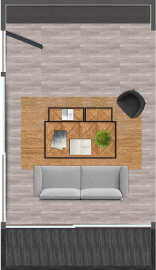 Diseño de un espacio interior con un sofá moderno y una mesa de centro decorativa que incluye elementos como plantas y libros, ideal para una vivienda modular. Este ambiente refleja la comodidad y funcionalidad que se puede encontrar en casas prefabricadas. Tecno Fast Home.