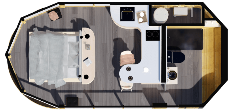 Vista superior de una casa modular con un diseño moderno y funcional, que incluye una cocina abierta y un área de estar cómoda. Ideal para quienes buscan una vivienda prefabricada eficiente y estilizada. Tecno Fast Home.