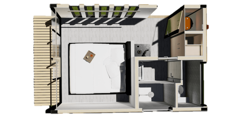 Vista a&eacute;rea de una habitaci&oacute;n en una vivienda modular, que incluye una cama principal, un &aacute;rea de estar y un ba&ntilde;o peque&ntilde;o, ideal para una segunda vivienda o casa prefabricada. Espacio moderno y funcional, dise&ntilde;ado para maximizar la comodidad. Tecno Fast Home.