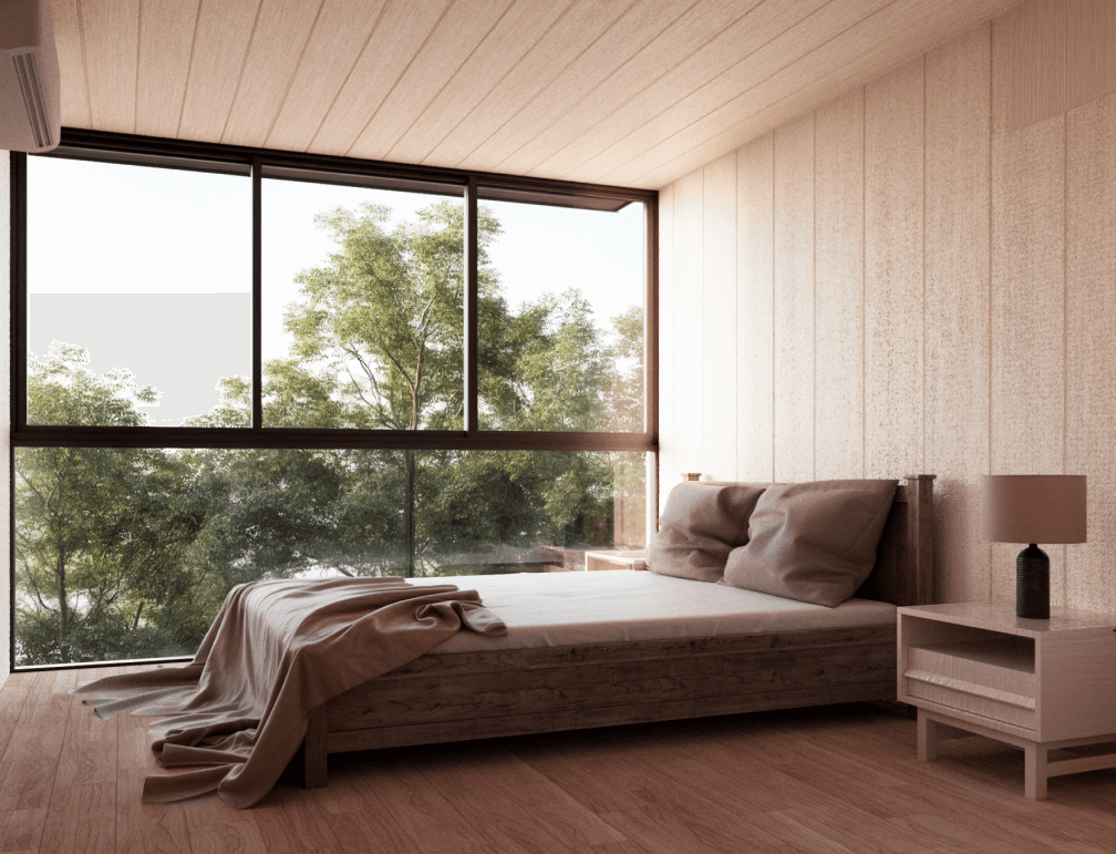Habitación moderna con grandes ventanales que ofrecen vistas al exterior, equipada con una cama de diseño minimalista y muebles de madera. Ideal para una vivienda modular o casa prefabricada que brinda confort y estilo. Tecno Fast Home.