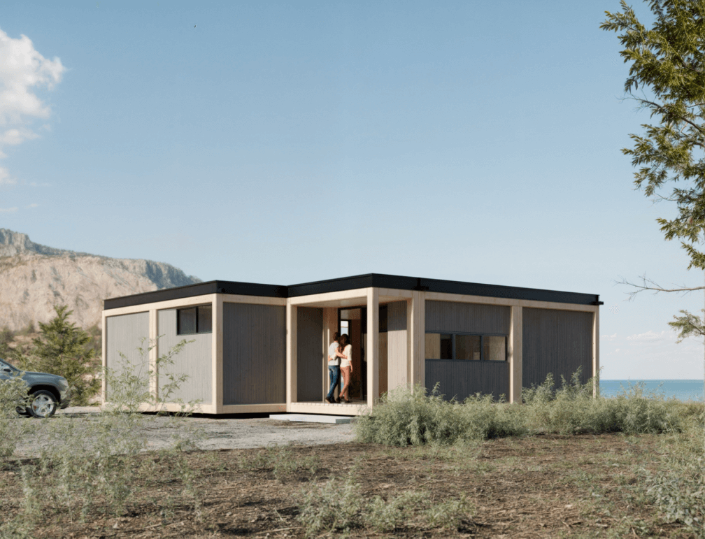 Casa modular contemporánea ubicada en un entorno natural, ideal como segunda vivienda. Su diseño funcional y estético permite la integración con el paisaje. Esta vivienda prefabricada ofrece comodidad y modernidad. Tecno Fast Home.