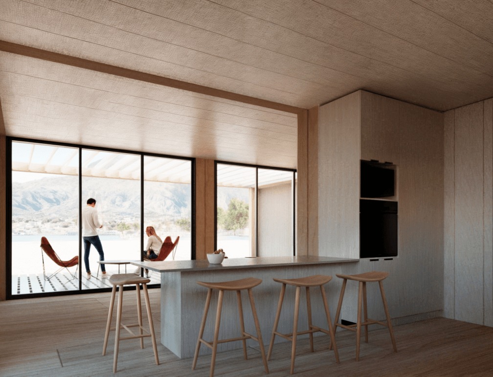 Interior de una vivienda modular con un diseño contemporáneo, mostrando una cocina abierta y un espacio de estar con grandes ventanales que ofrecen vistas panorámicas. La decoración es minimalista, con muebles de madera clara. Ideal como segunda vivienda o casa prefabricada. Tecno Fast Home.
---
Ambiente acogedor de una casa modular, donde se pueden observar detalles de un interior moderno y funcional. Las amplias ventanas permiten la entrada de luz natural, creando un espacio ideal para disfrutar en familia. Perfecta opción para quienes buscan una vivienda eficiente. Tecno Fast Home.